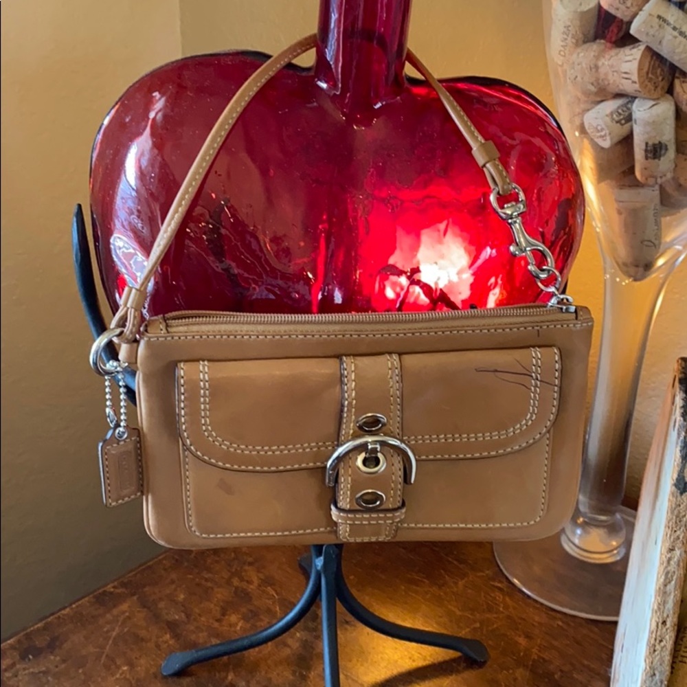 Coach all natural leather Wristlet